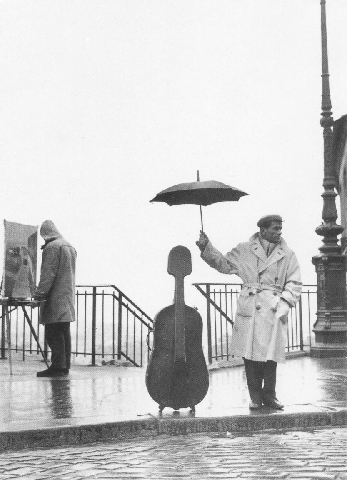 doisneau_-_musician_in_rain_5208.jpg